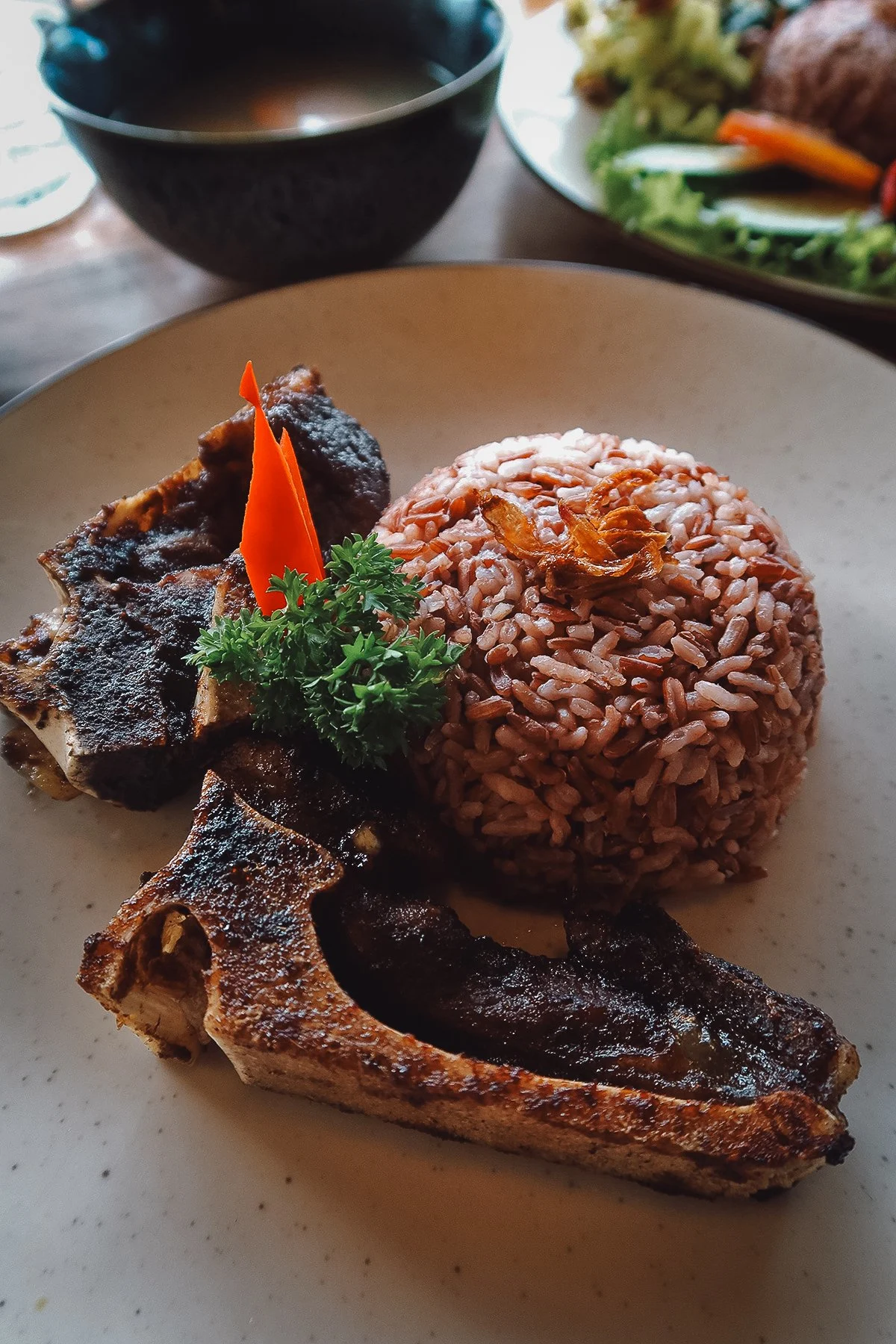 Grilled ox tail and rice at a restaurant in Ubud