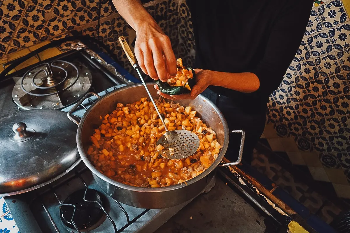 Stuffing the poblano chiles