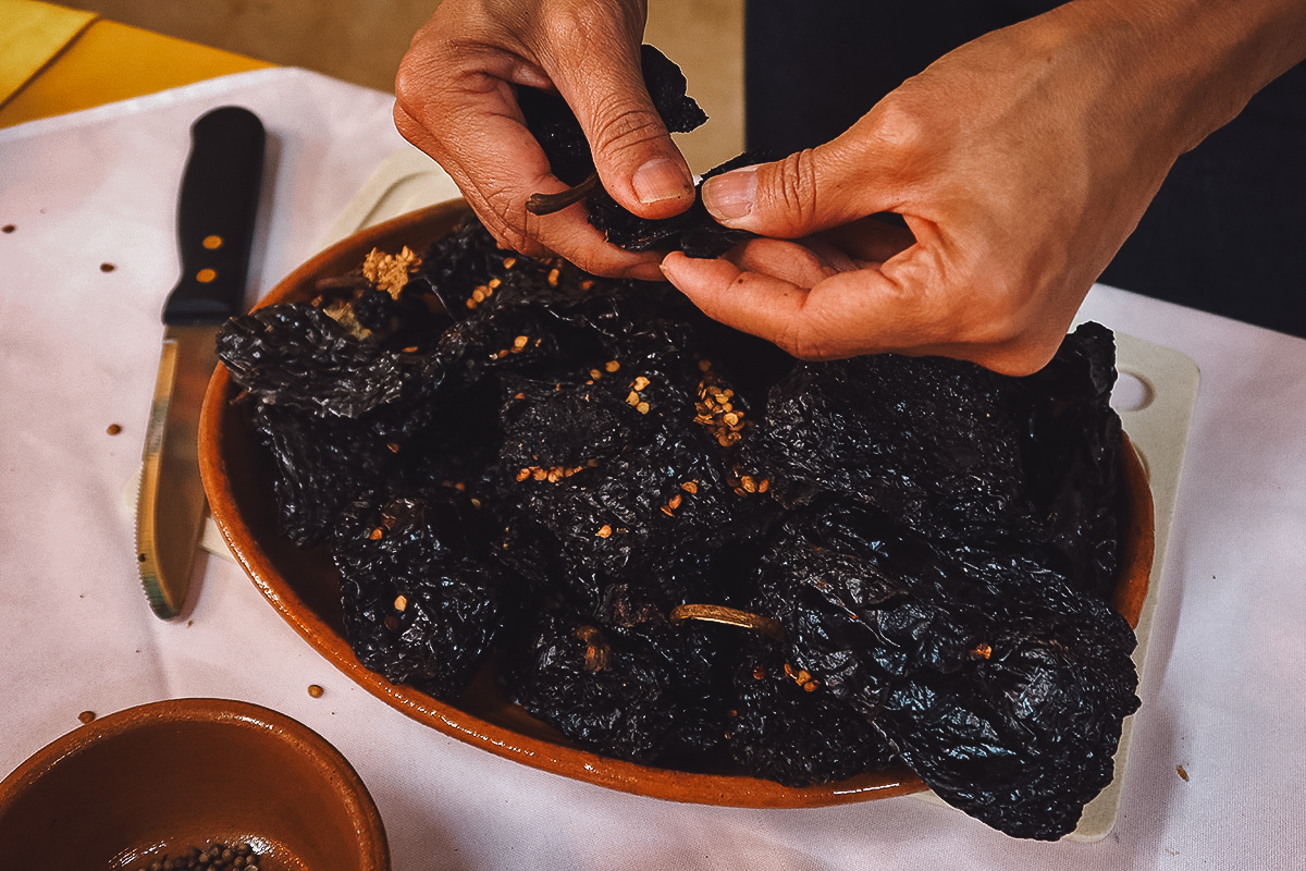 Removing the seeds from chili peppers