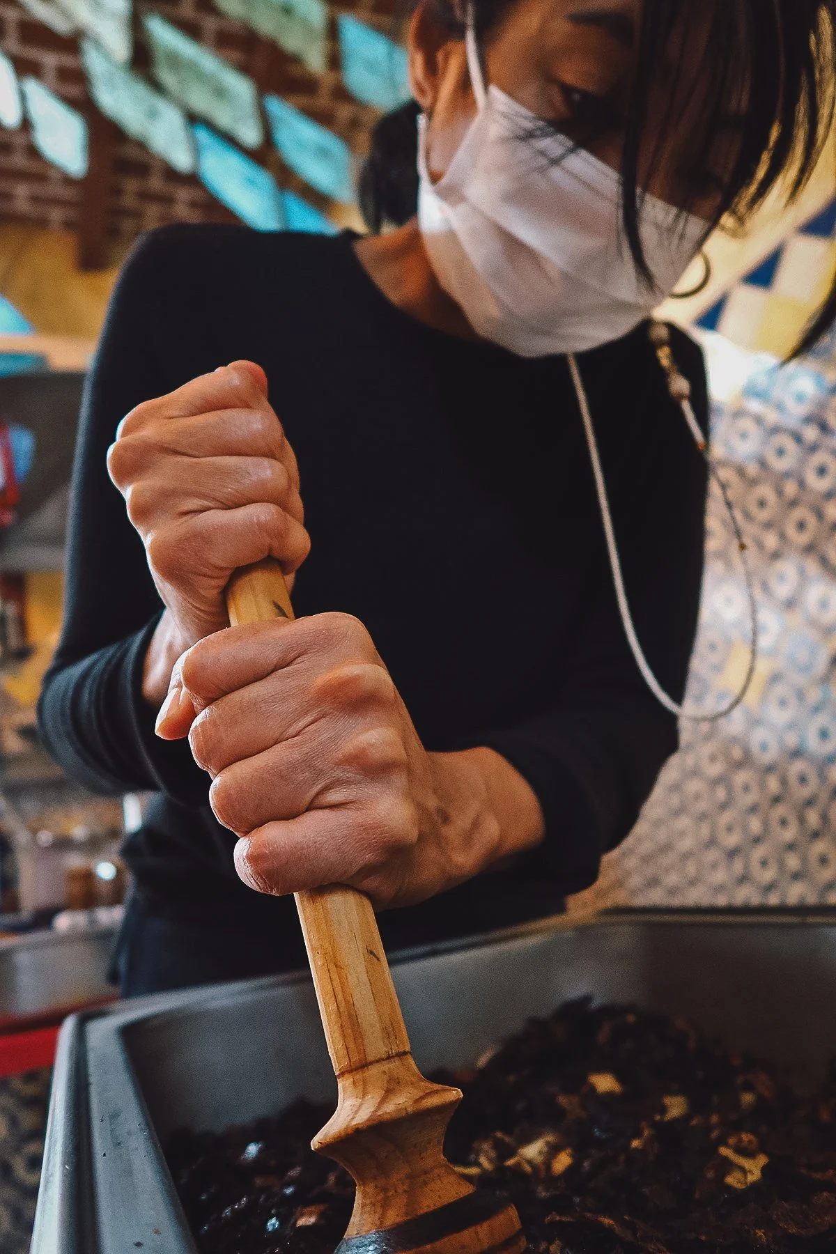 Grinding chili peppers