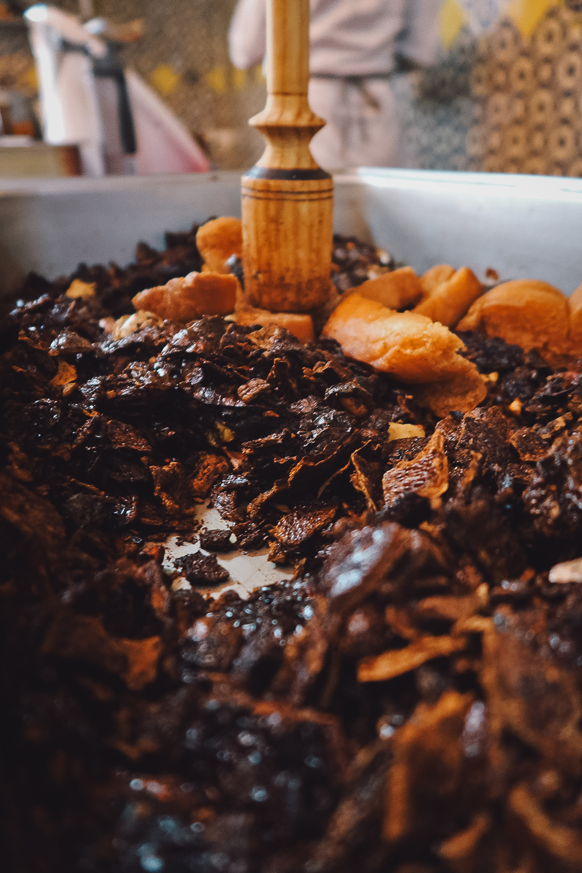 Pestle with chili peppers and bread