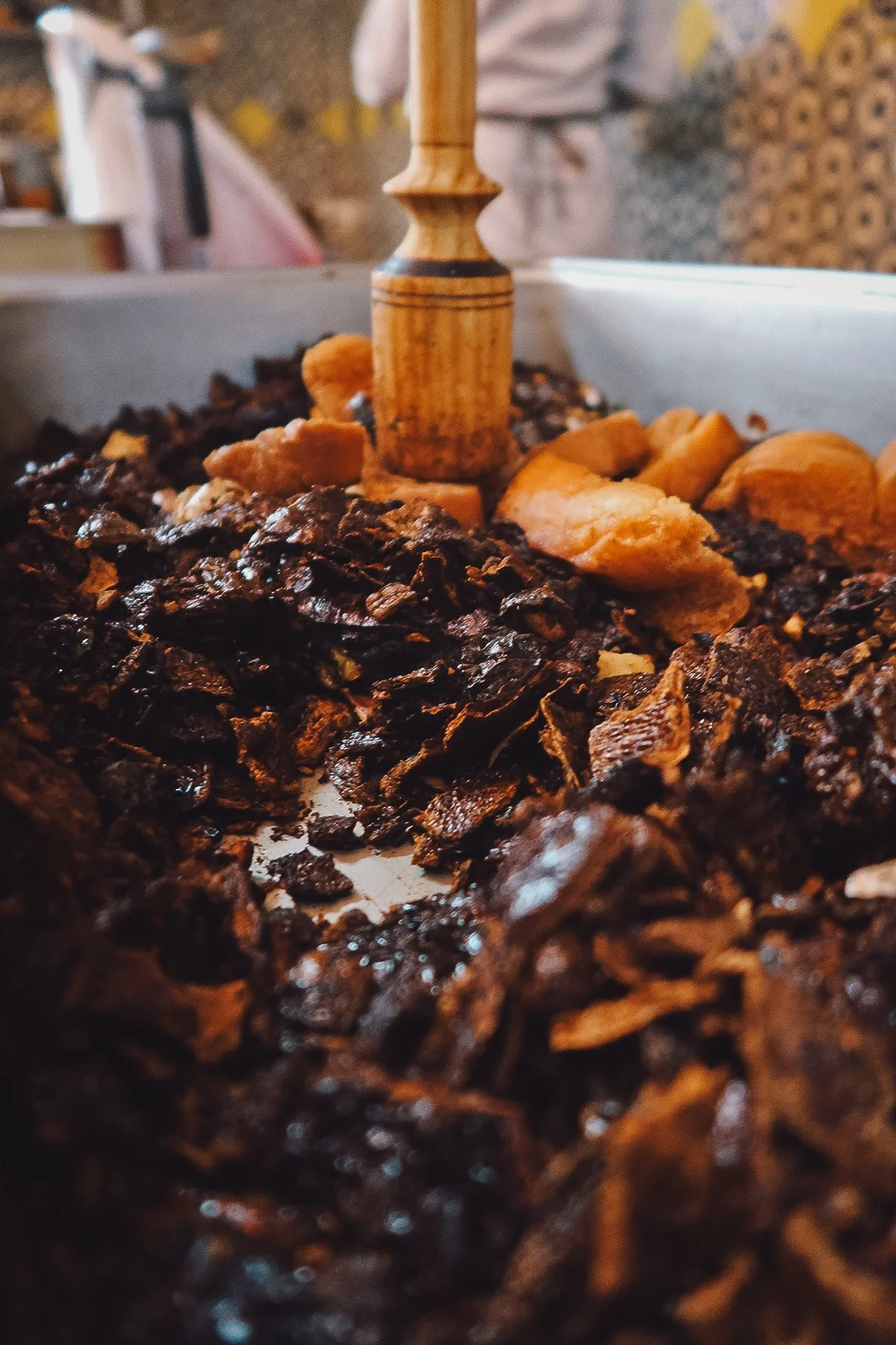 Pestle with chili peppers and bread