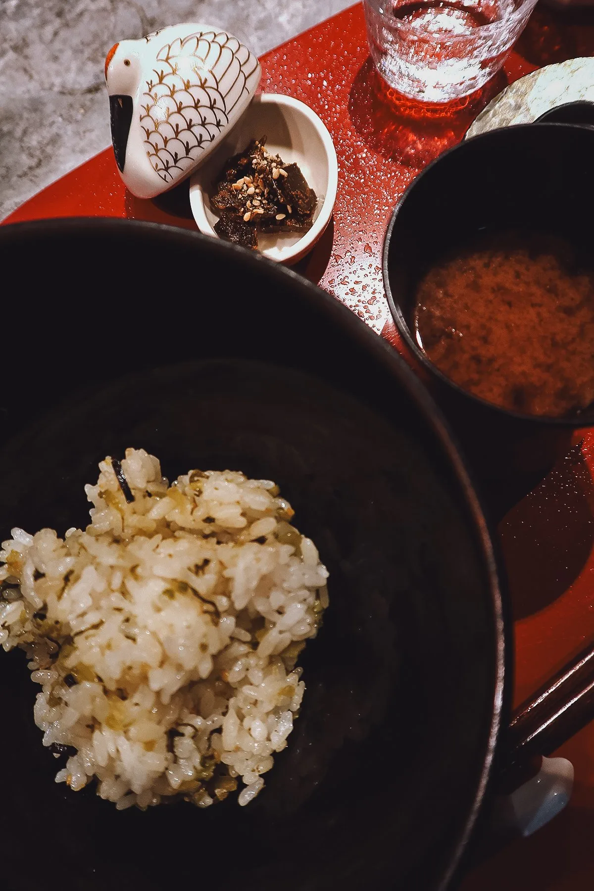 Rice boiled with greens, miso soup, and tsukudani kombu